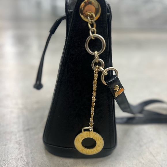 Small Black Crossbody Bag with Gold Accents and Drawstring Closure - Picture 8 of 13